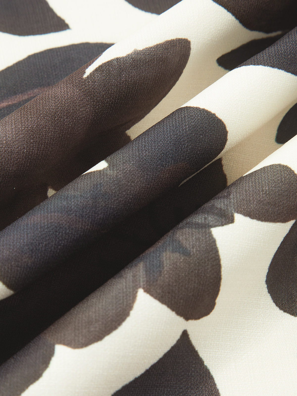 Rückenfreies, bedrucktes Kleid mit Schlitz und Reißverschluss von Serine