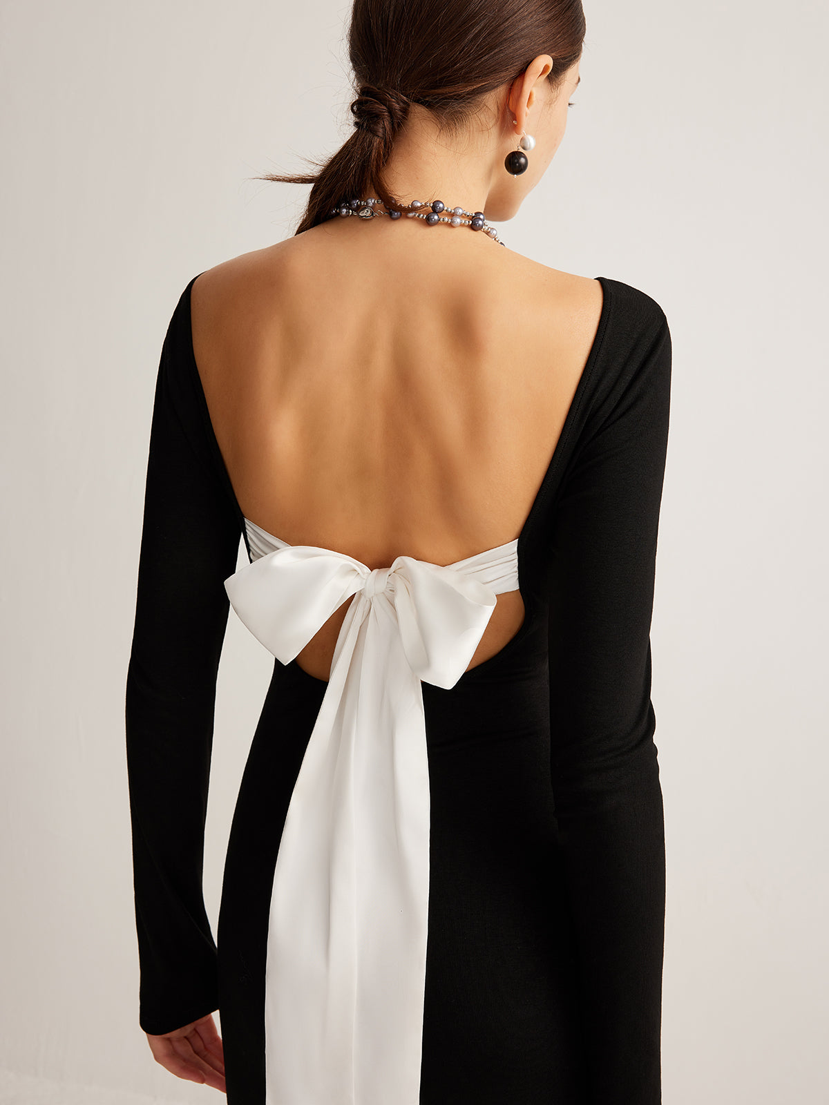 Iridfire Bow Open Back Knit Dress
