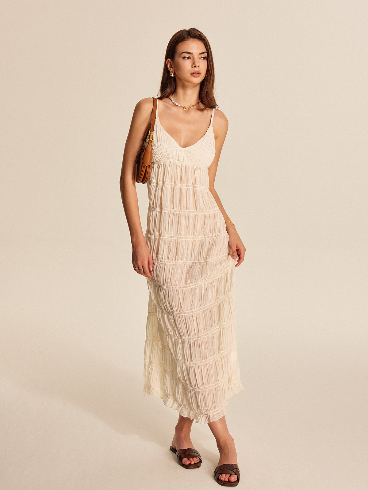 Shimwind – Halbtransparentes Plisseekleid mit Riemchen