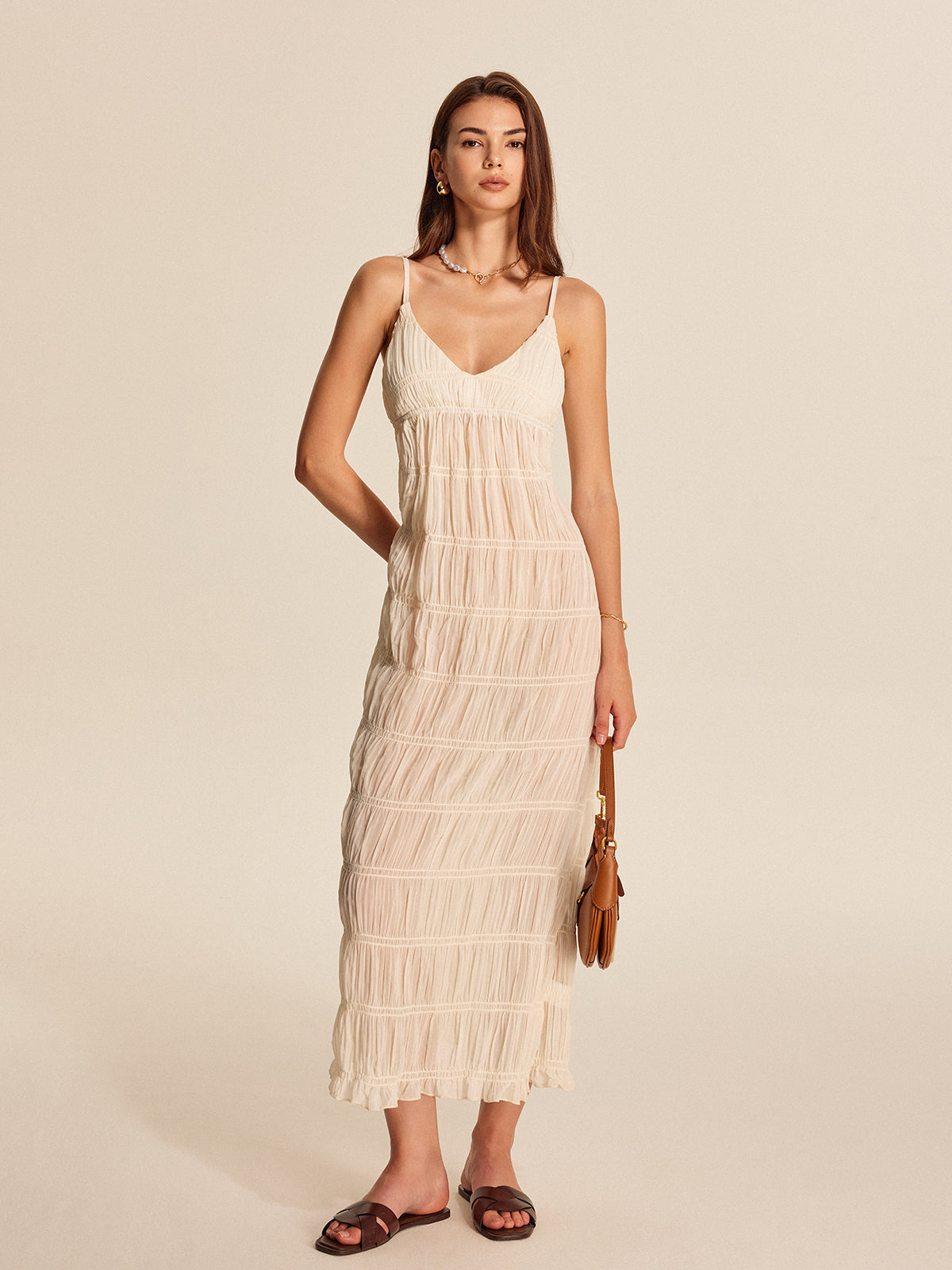 Shimwind – Halbtransparentes Plisseekleid mit Riemchen