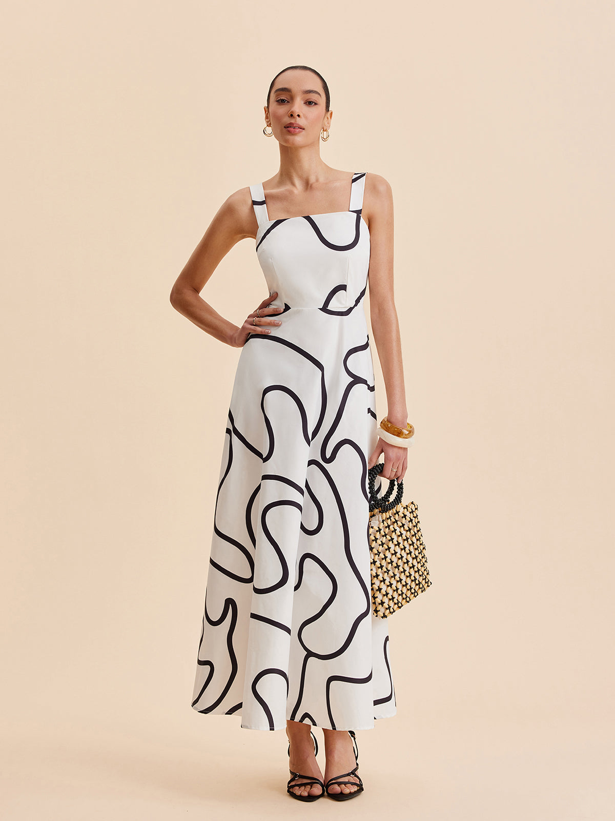 Nara Kleid mit quadratischen Trägern und abstraktem Liniendruck