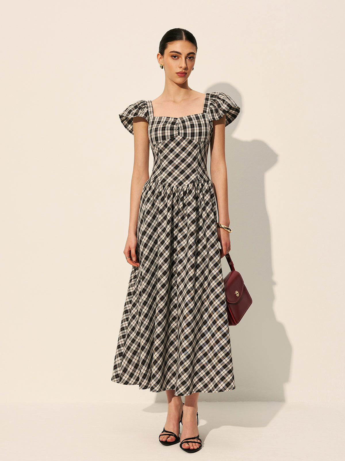 Majestweave – Kleid mit Puffärmeln und Schachbrettmuster