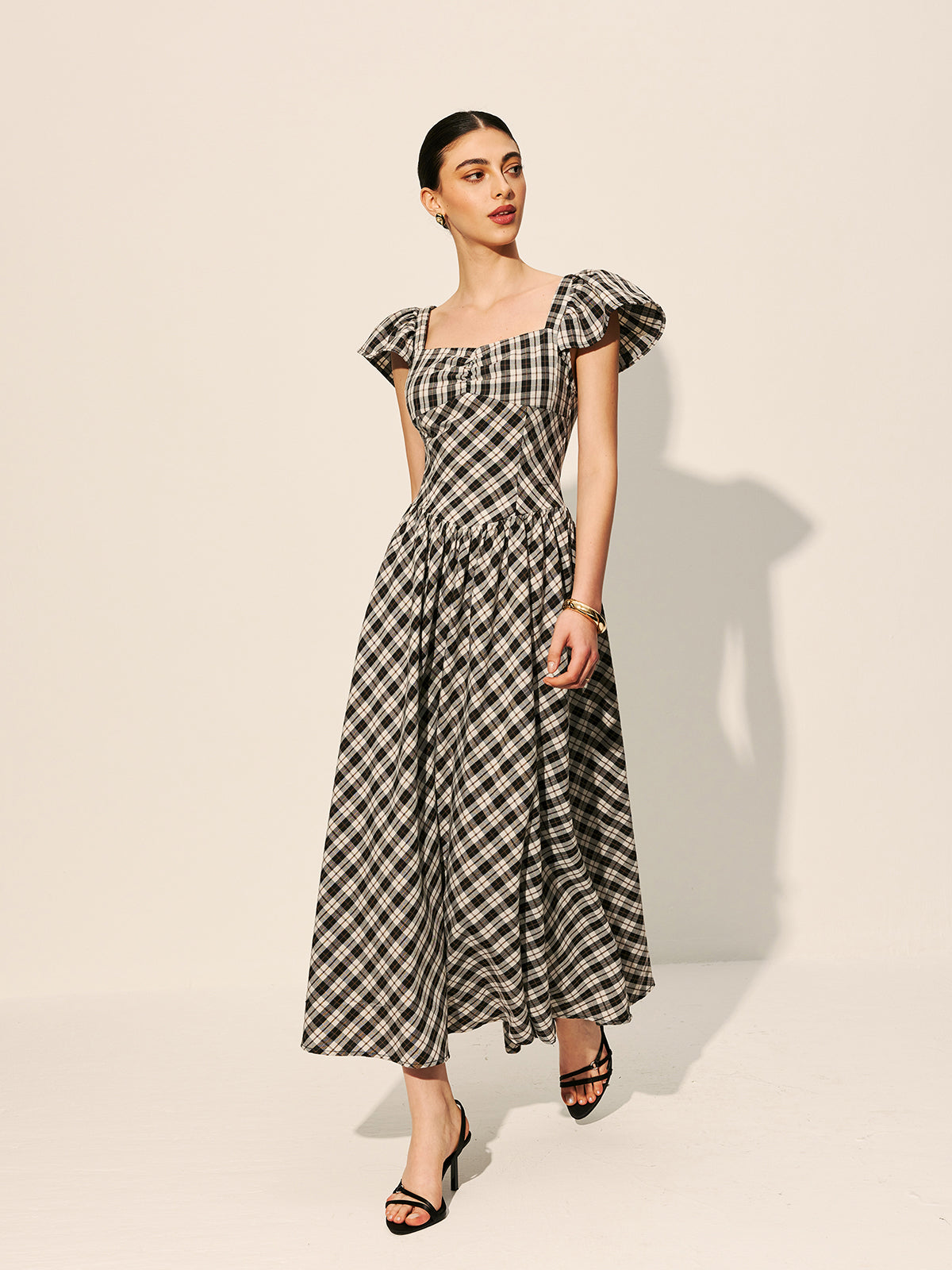 Majestweave – Kleid mit Puffärmeln und Schachbrettmuster