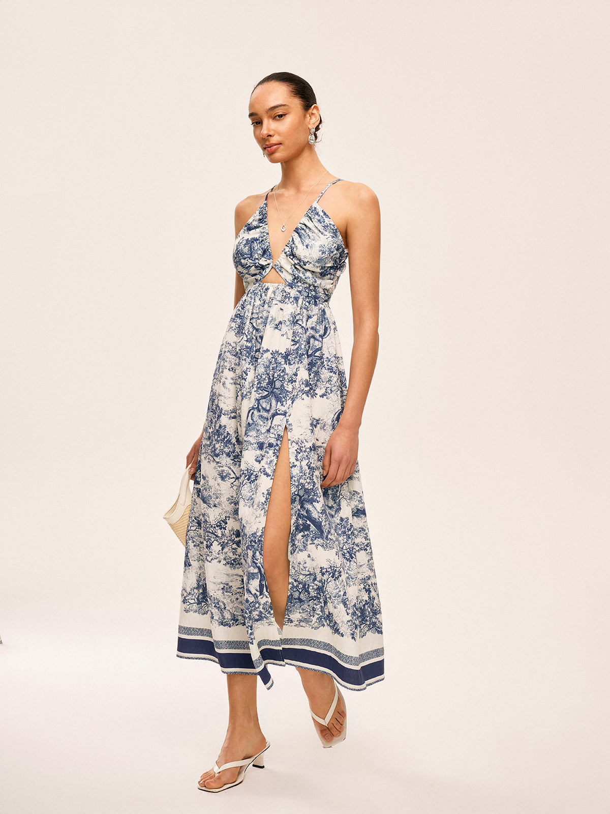 Splenddust – Bedrucktes Kleid mit kontrastierendem Besatz und Knoten