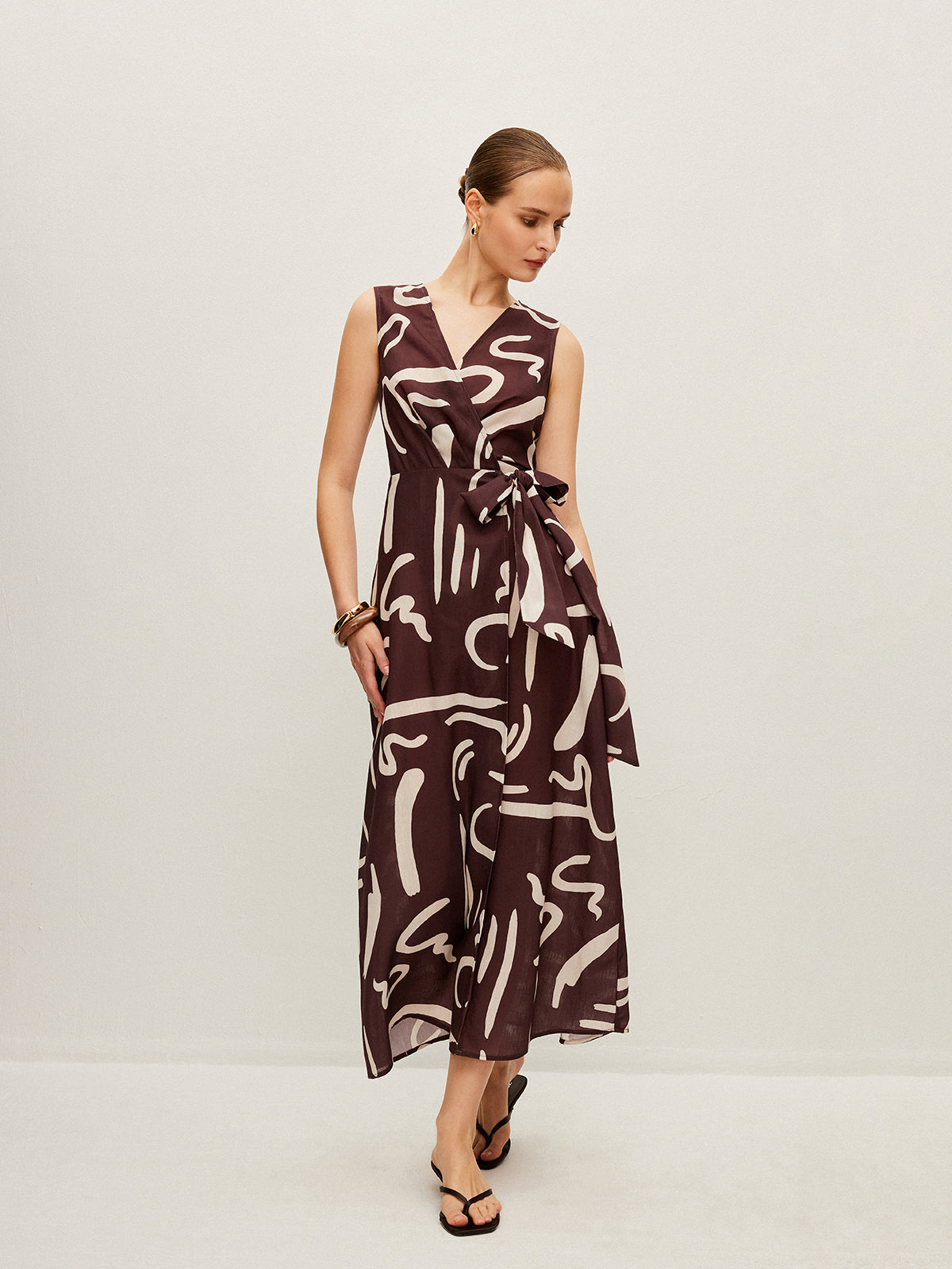 Dreamwind – Wickelkleid mit abstraktem Print und Bindegürtel