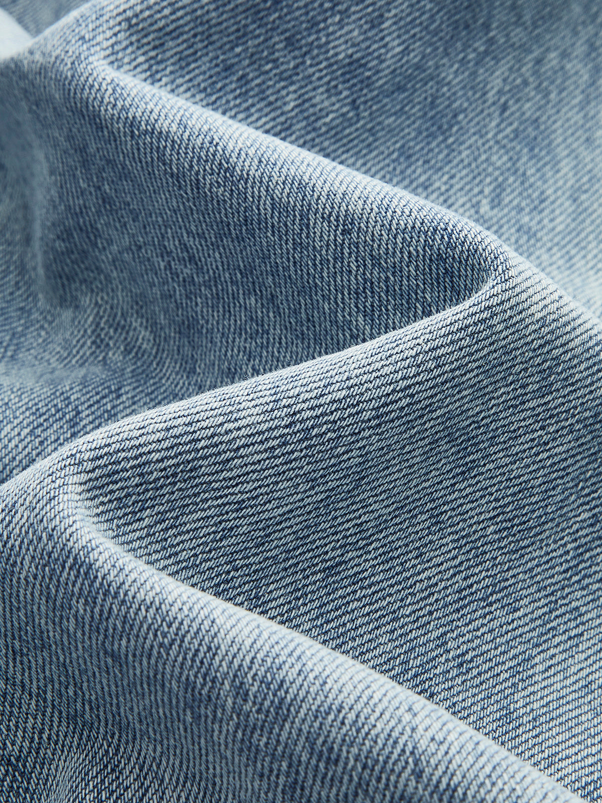 Norane jeans med asymmetrisk midja och vida ben