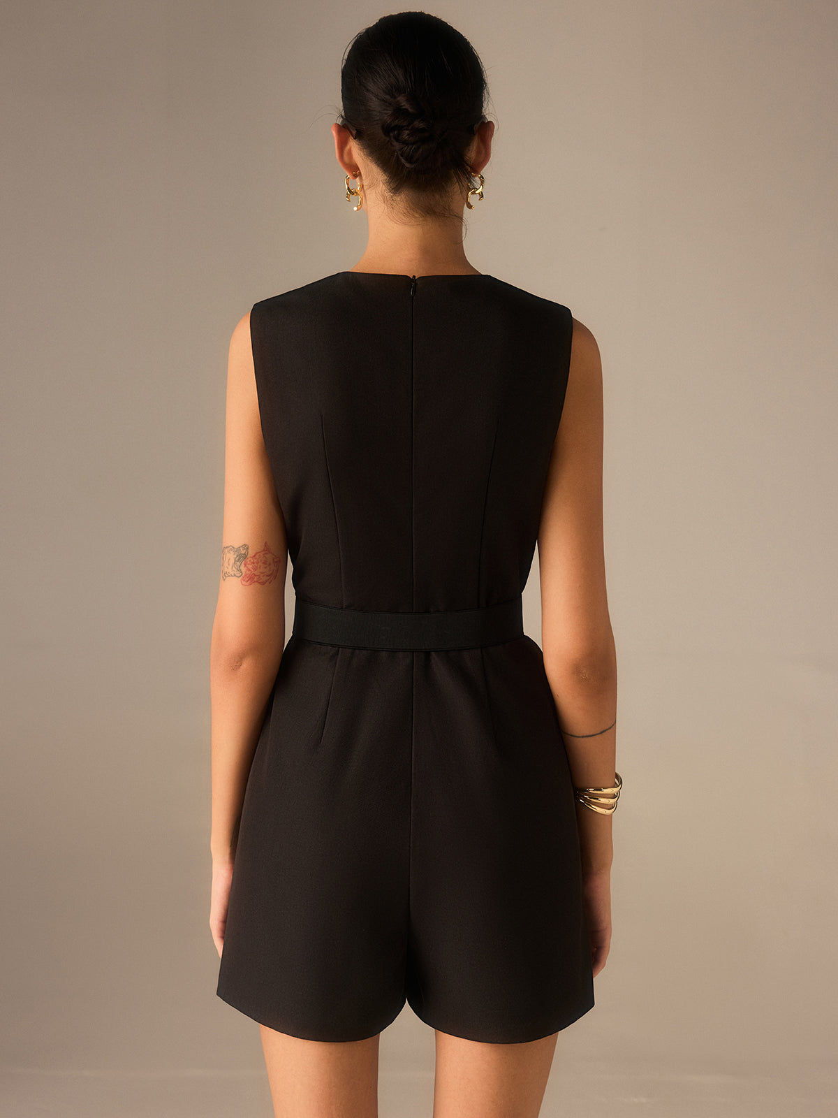 Iselvine Jumpsuit med metallknappar och skärp