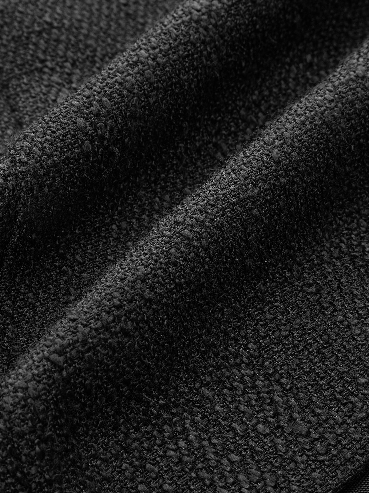 Ärmlös miniklänning i tweed med knappar i etherene-modell