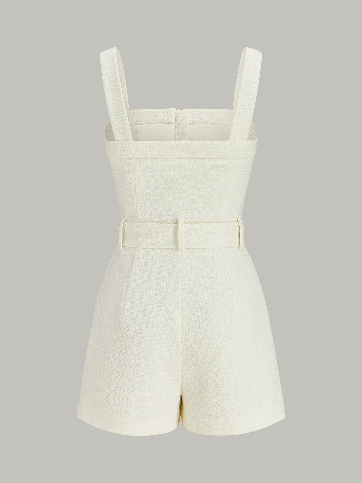 Jumpsuit med texturerad dragkedja och skärp i velourfire