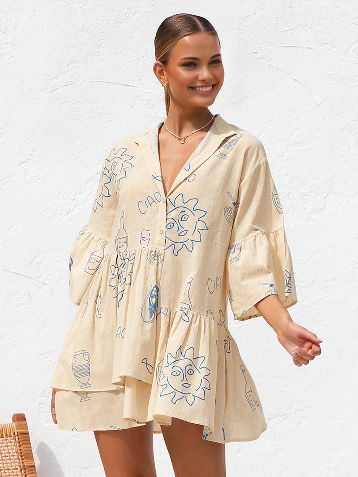 Norys – Kurzes Oversize-Kleid mit Sonnenprint 