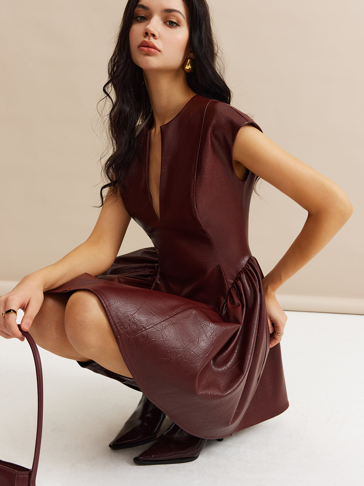 Miraclelace – Plissiertes Kleid mit Einsätzen aus Kunstleder 