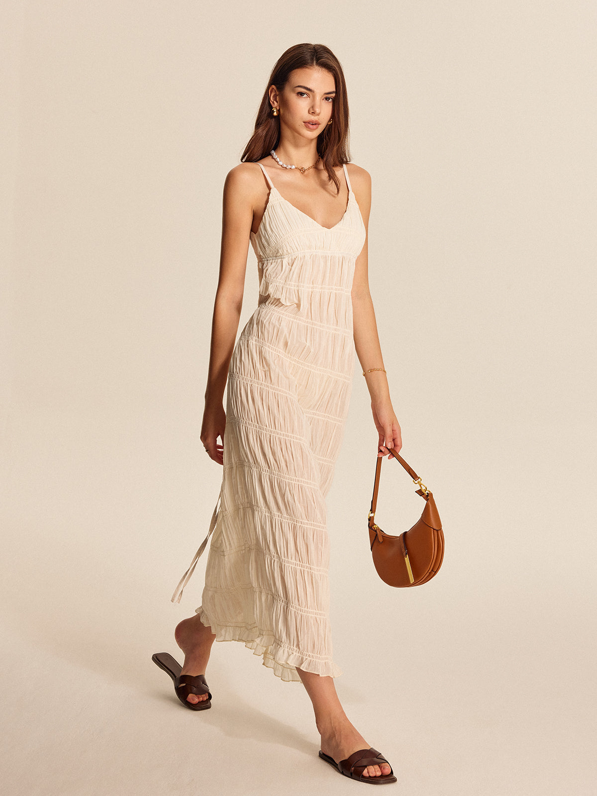 Shimwind – Halbtransparentes Plisseekleid mit Riemchen 