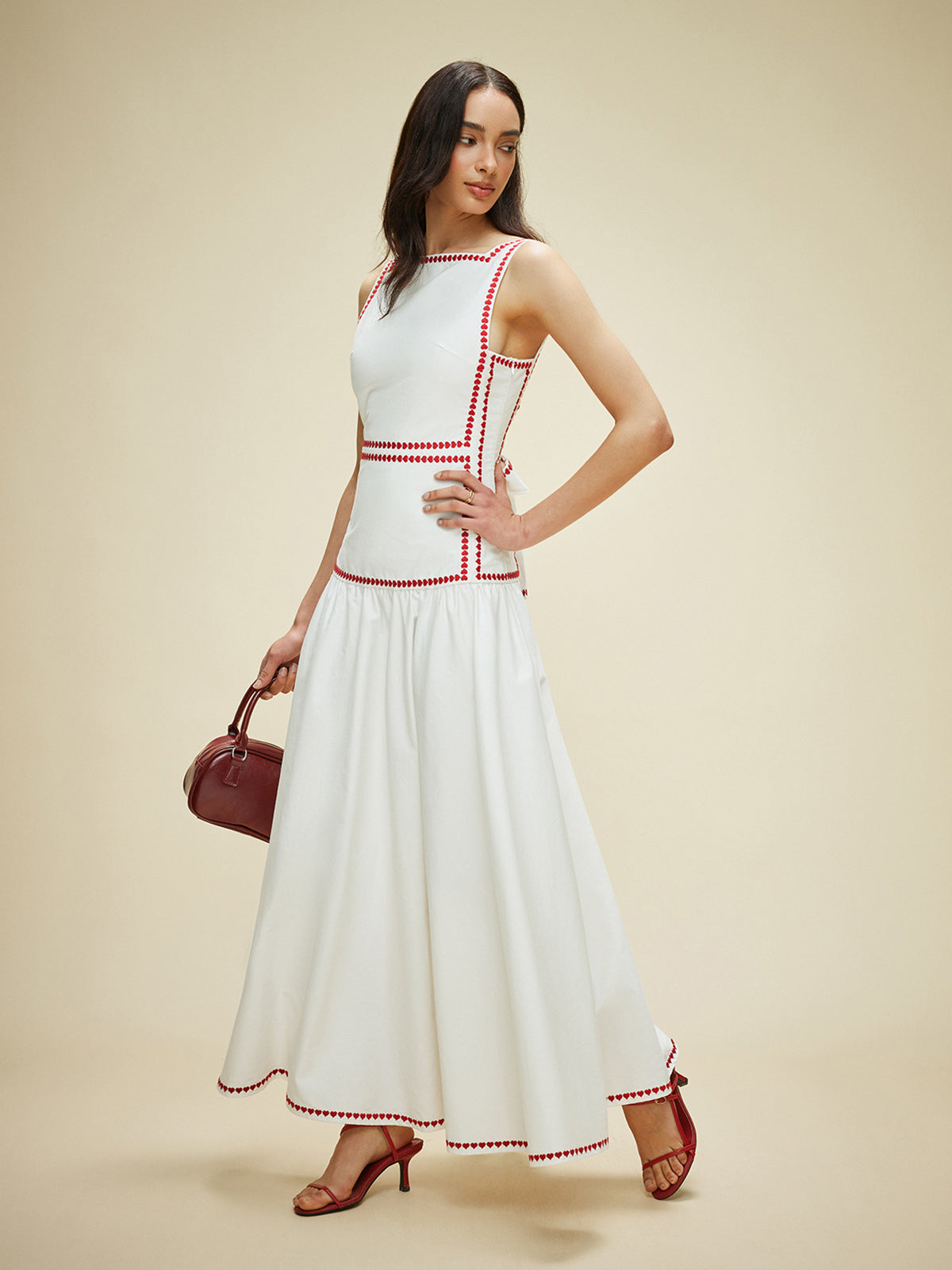 Sareth Baumwollkleid mit Kontrastbesatz und Bindeband auf der Rückseite 