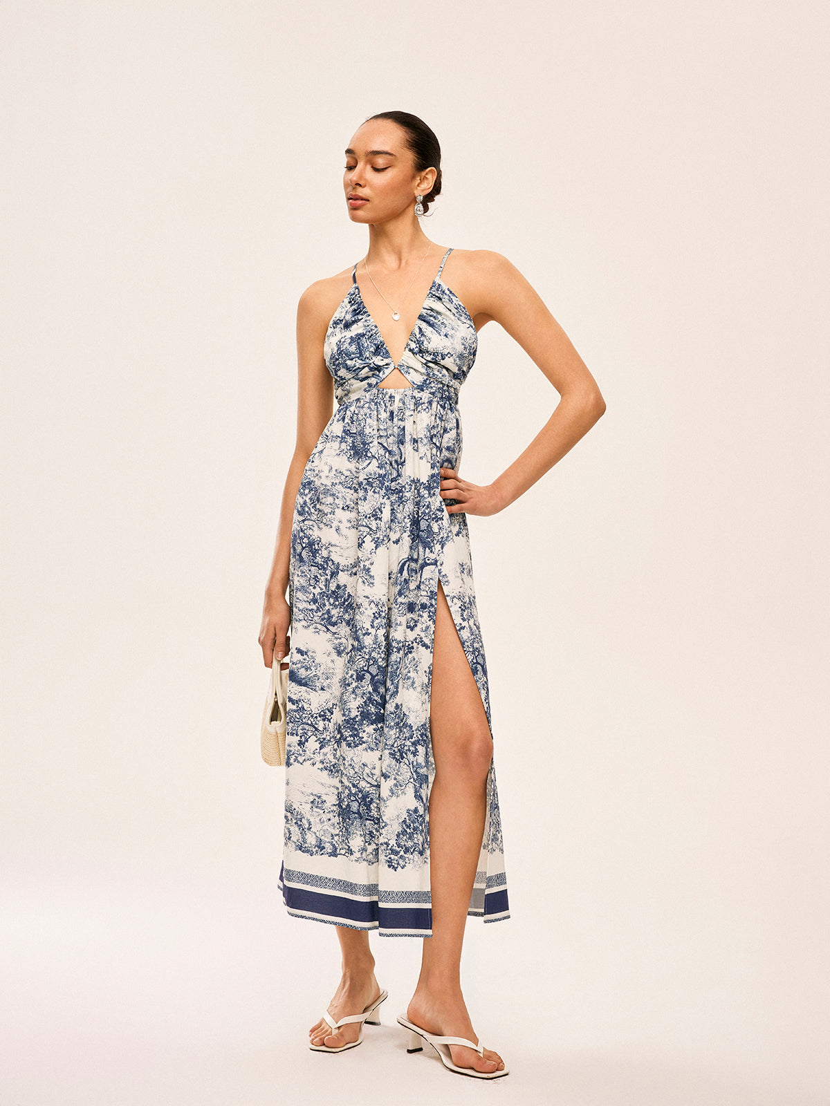 Splenddust – Bedrucktes Kleid mit kontrastierendem Besatz und Knoten 