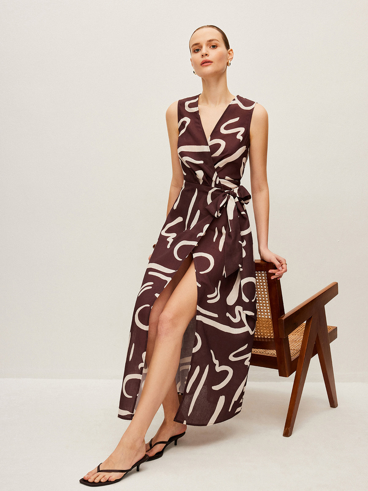 Dreamwind – Wickelkleid mit abstraktem Print und Bindegürtel 